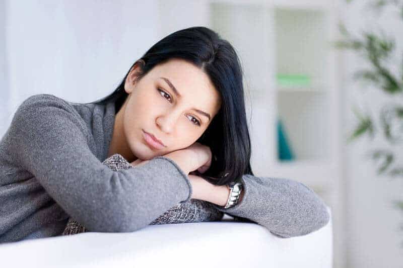 woman looking depressed with brain fog