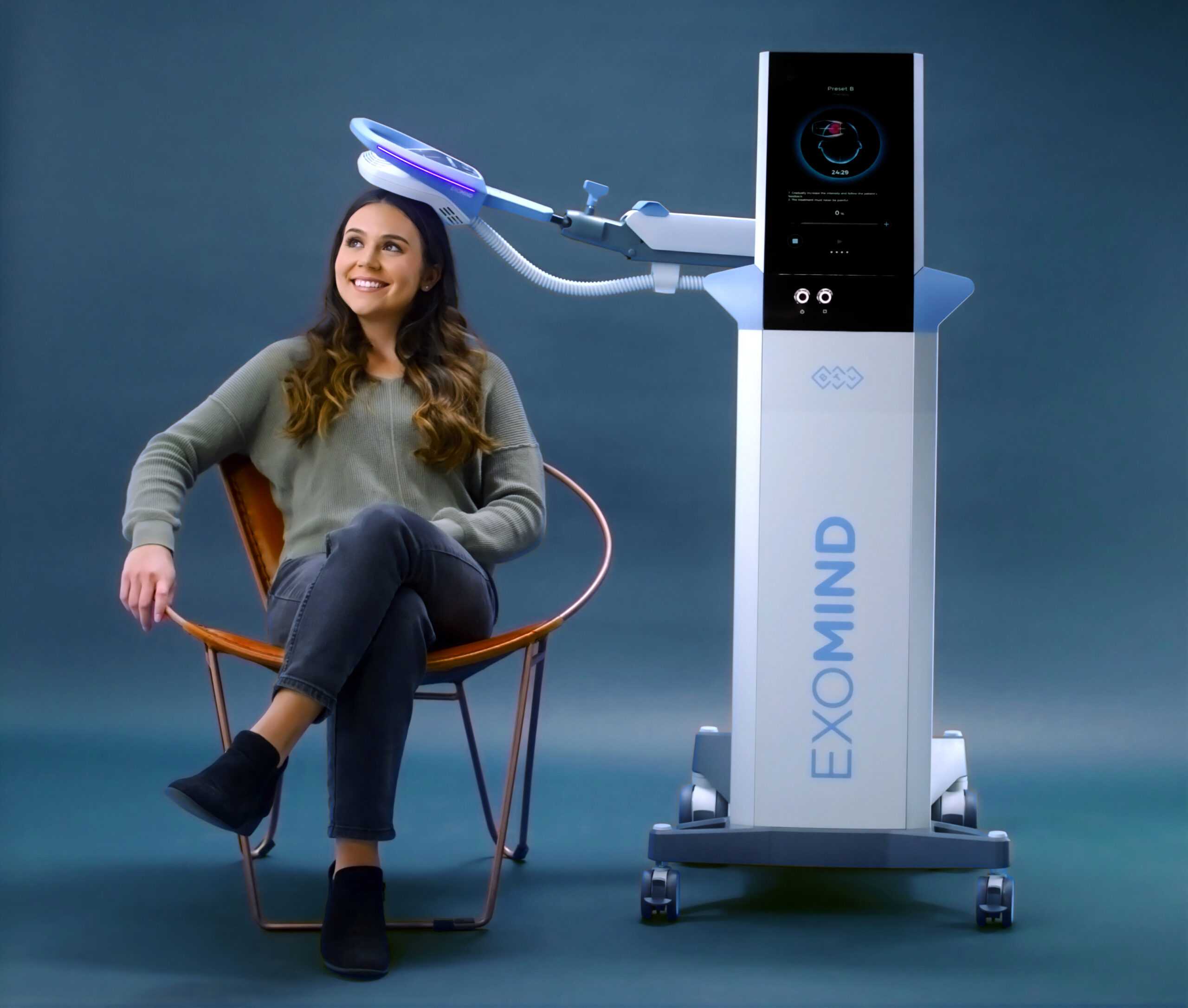 TMS Therapy 3 Exomind PIC Female Model3 1224 ENUS100 scaled